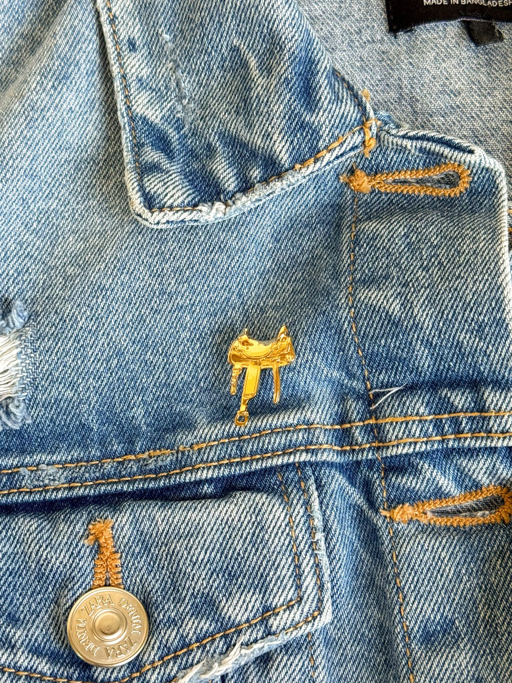 Broche-Sela